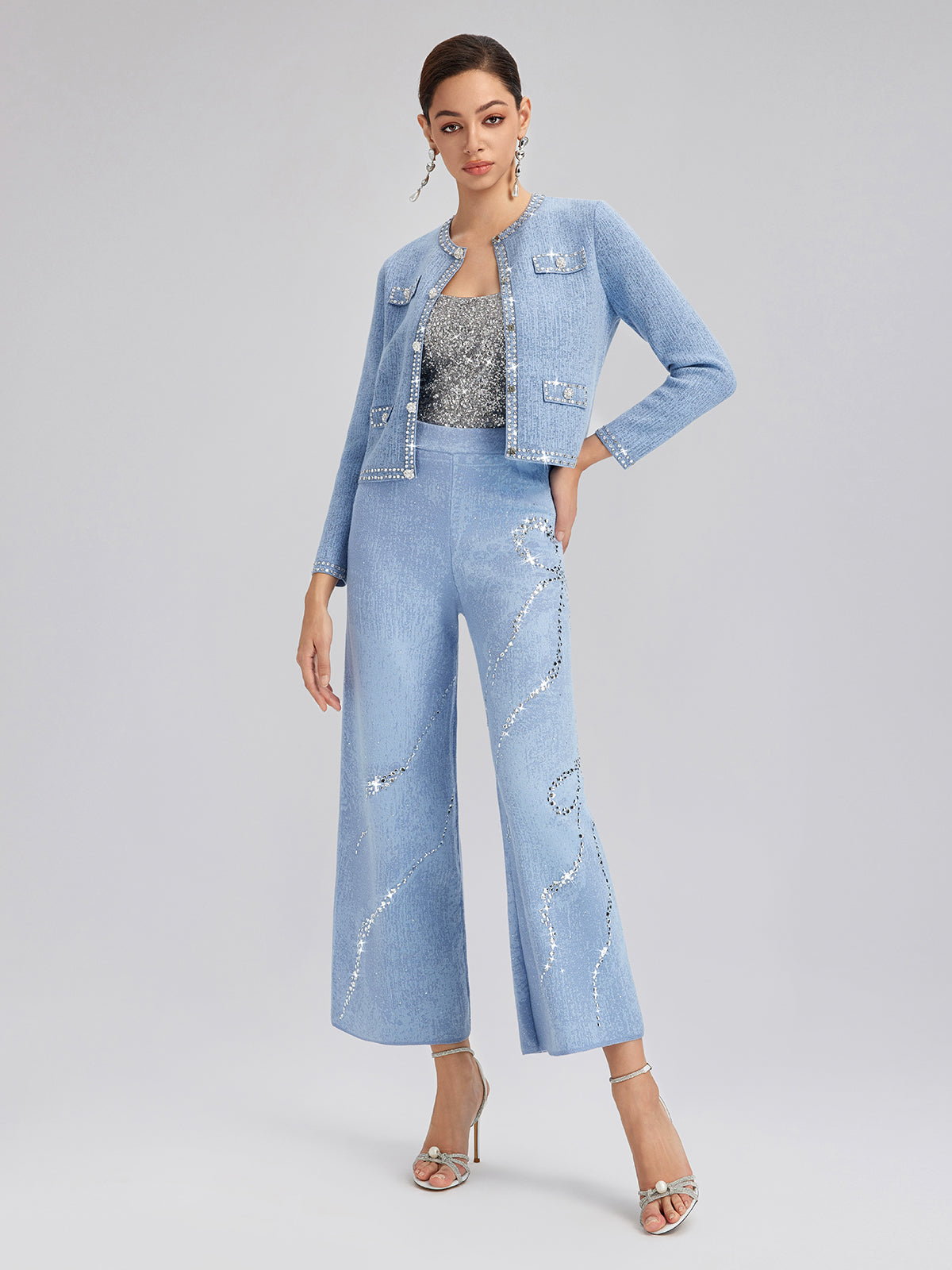 Pantalones elásticos de lana con pedrería